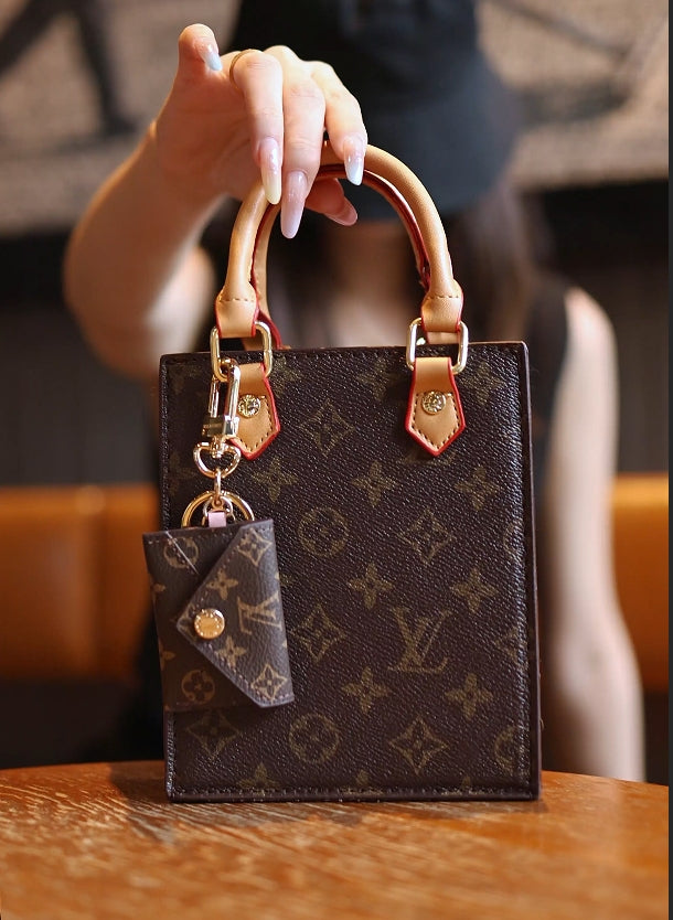 Keychain phone bag crafted by a celebrity designer